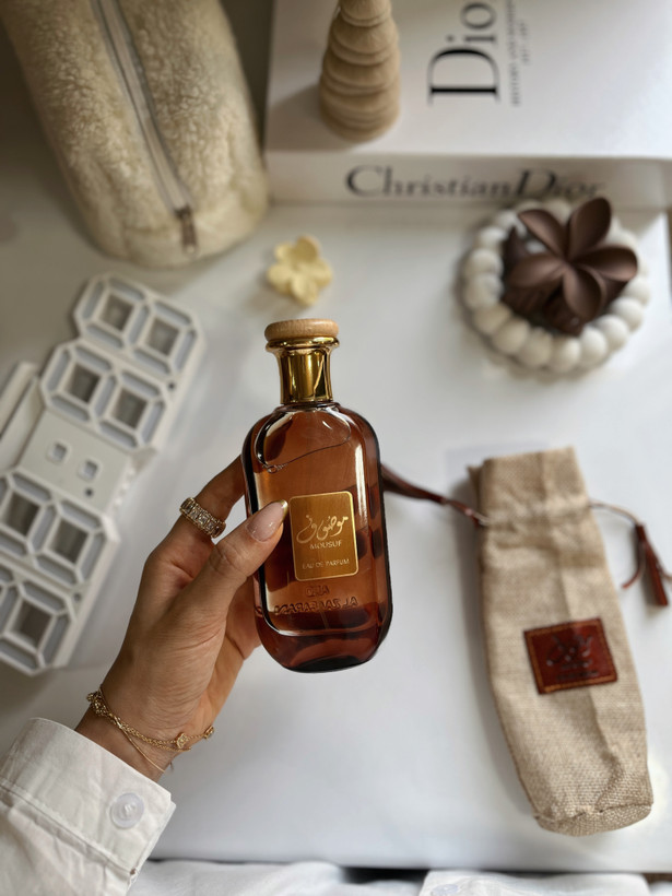 عطر ادکلن موصوف قهوه ای ارض الزعفران